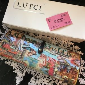 Lutci Bella clutch handbag.